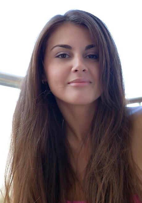 Stunning brunette teen Astrud A baring big boobs and hairy twat in the bathroom