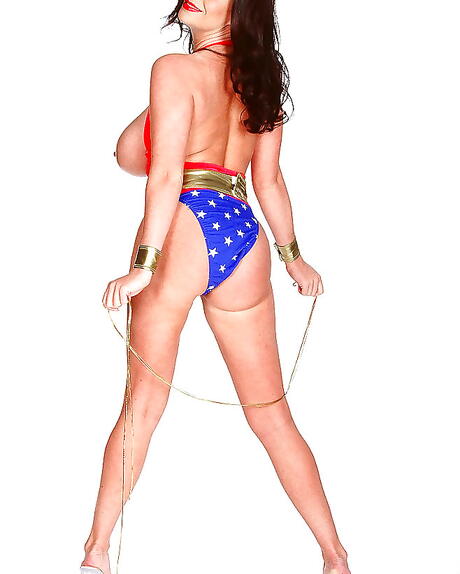 Lovely brittish milf Linsey Dawn Mckenzie exposing big boobies and spreading her legs 